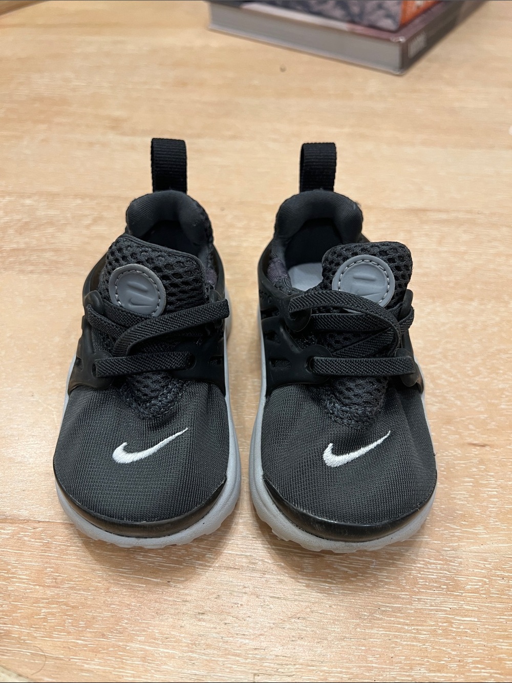 Nike Kids Black and White Slip-On Sneaker with Mesh Upper